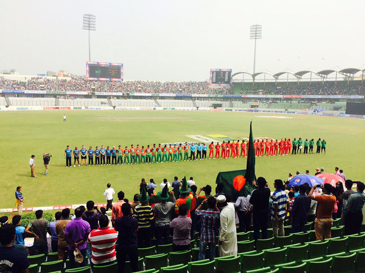 Players from both teams observe a minute's silence in memory of Phillip Hughes, Bangladesh v Zimbabwe, 4th ODI, Mirpur, November 28, 2014