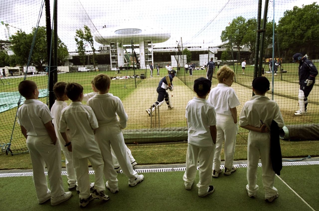 Children watch the England team practise in the nets at Lord's, July 21, 1990