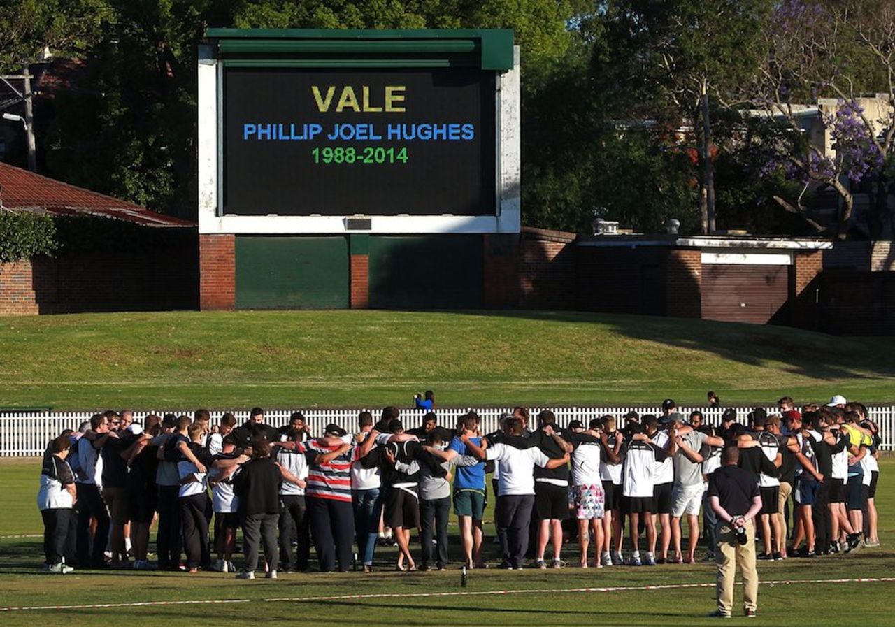 Members of the Western Suburbs cricket club, where Phillip Hughes was a player, pay their respects, Sydney, November 28, 2014