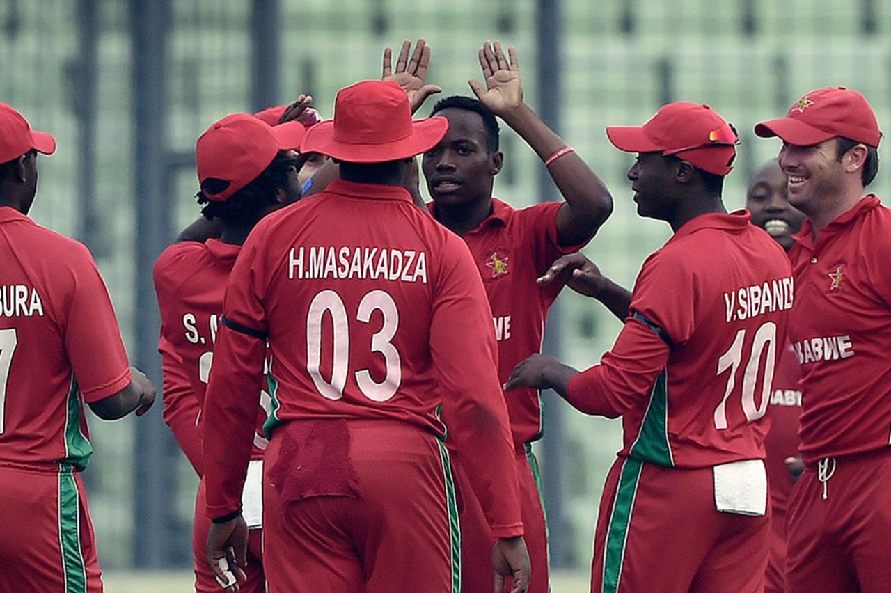 Zimbabwe's players celebrate the wicket of Anamul Haque, Bangladesh v Zimbabwe, 4th ODI, Mirpur, November 28, 2014