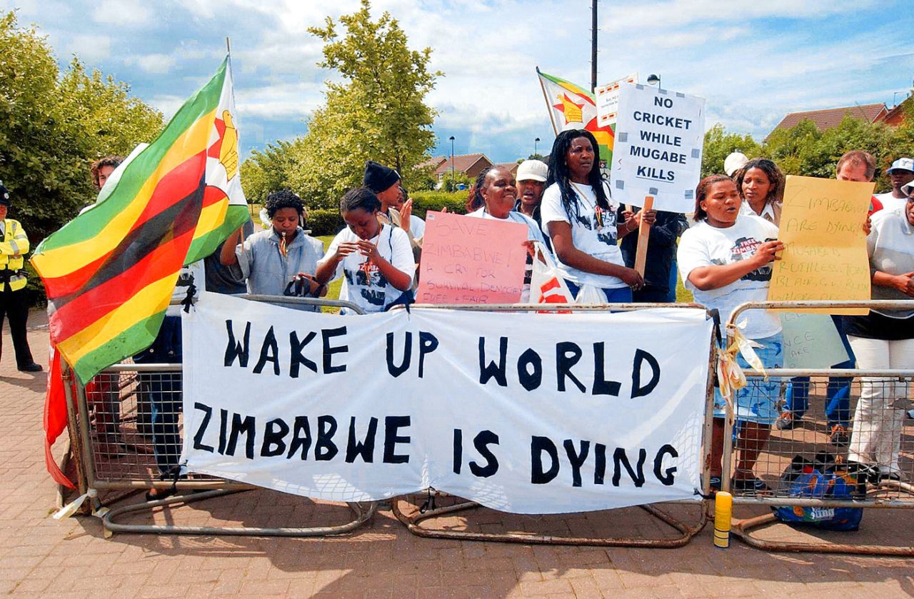 People demonstrate against Zimbabwean President Robert Mugabe's regime outside the Riverside Ground in Chester-le-Street, England v Zimbabwe, 2nd Test, Chester-le-Street, 1st day, June 5, 2003