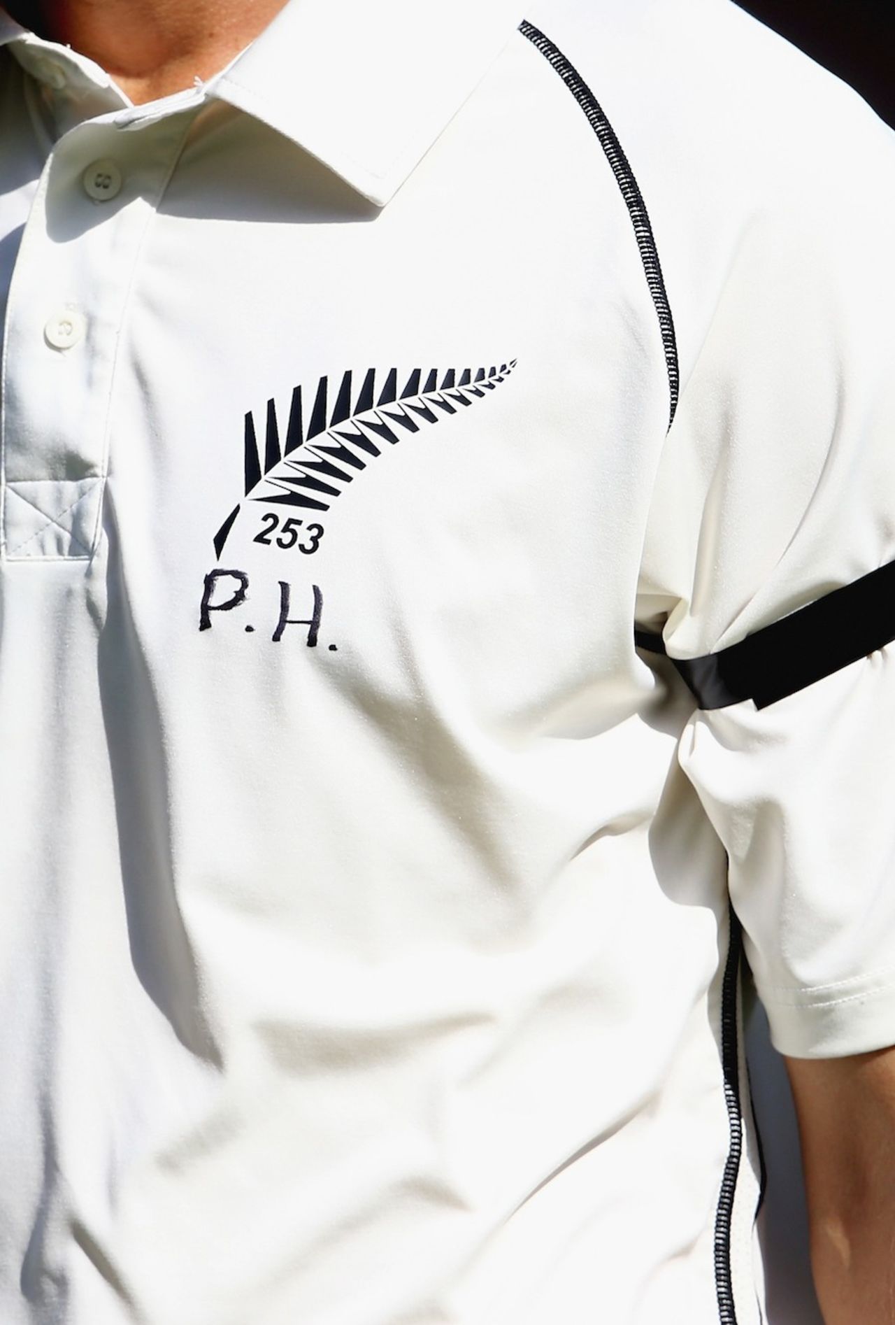 A New Zealand cricketer with Phillip Hughes' initials on his shirt, Pakistan v New Zealand, 3rd Test, Sharjah, 2nd day, November 28, 2014