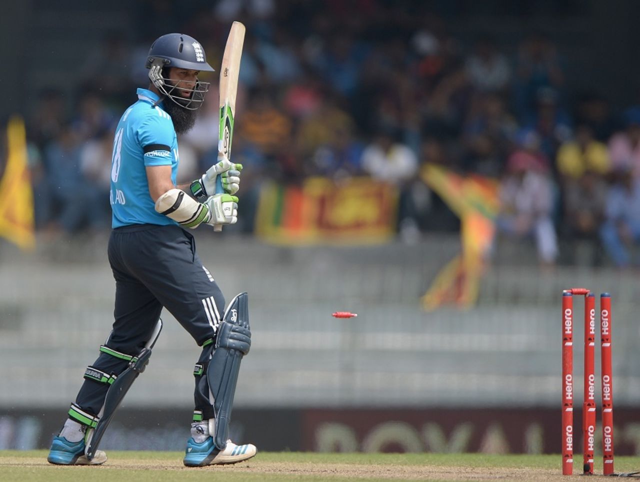 Moeen Ali looks back to see his stumps disturbed, Sri Lanka v England, 2nd ODI, Colombo, November 29, 2014