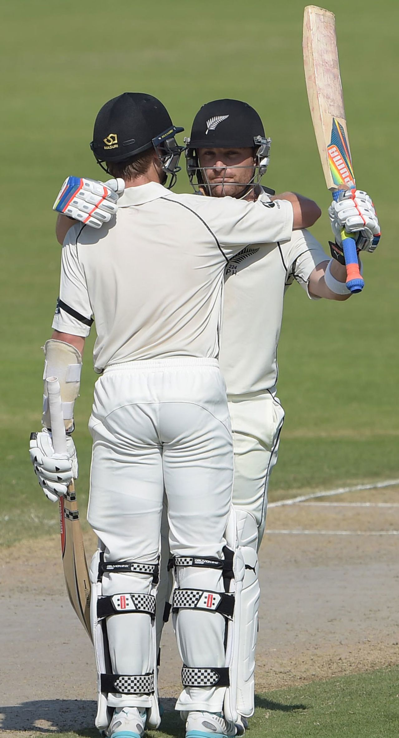 Kane Williamson hugs Brendon McCullum after the latter's double-century, Pakistan v New Zealand, 3rd Test, Sharjah, 3rd day, November 29, 2014