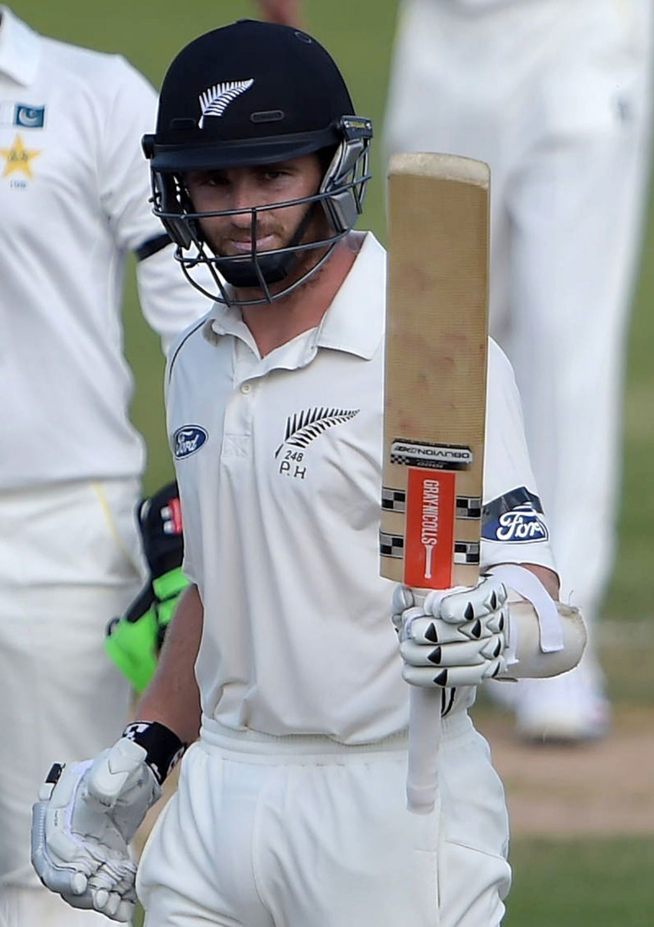 Kane Williamson quietly acknowledges the applause for his eighth Test century, Pakistan v New Zealand, 3rd Test, Sharjah, 3rd day, November 29, 2014