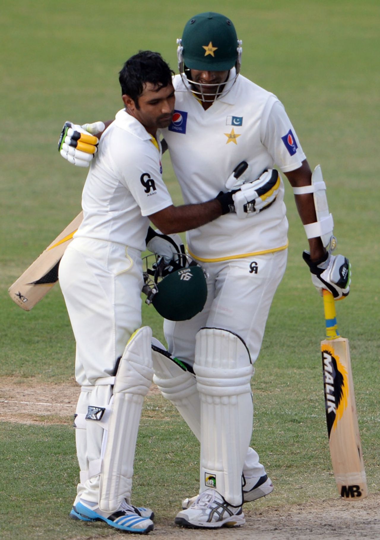 Asad Shafiq is congratulated by Rahat Ali after completing his century, Pakistan v New Zealand, 3rd Test, Sharjah, 4th day, November 30, 2014