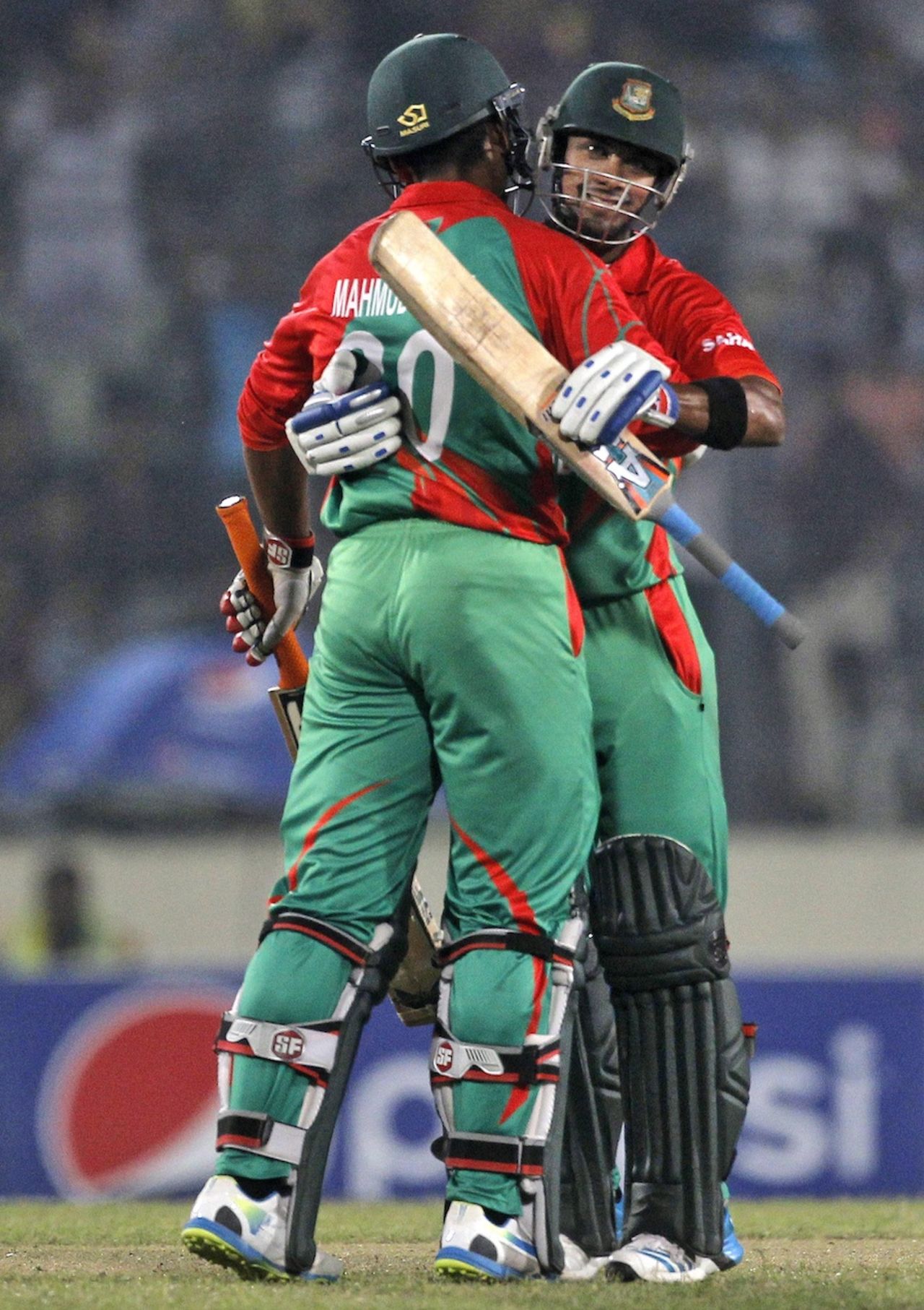 Mahmudullah and Sabbir Rahman celebrate Bangladesh's win, Bangladesh v Zimbabwe, 5th ODI, Mirpur, December 1, 2014