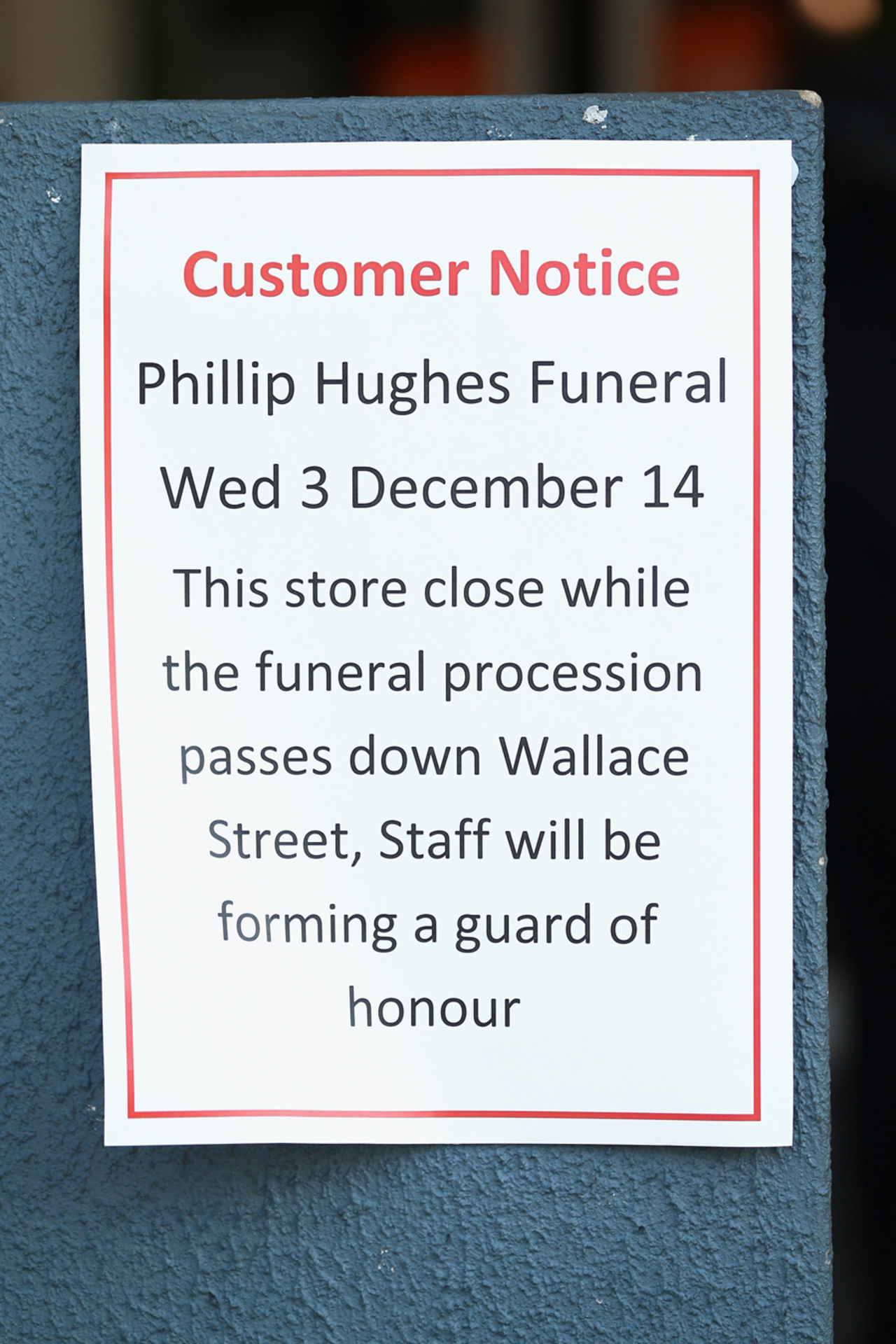 A store puts out a notice on the eve of Phillip Hughes' funeral, Macksville, December 2, 2014