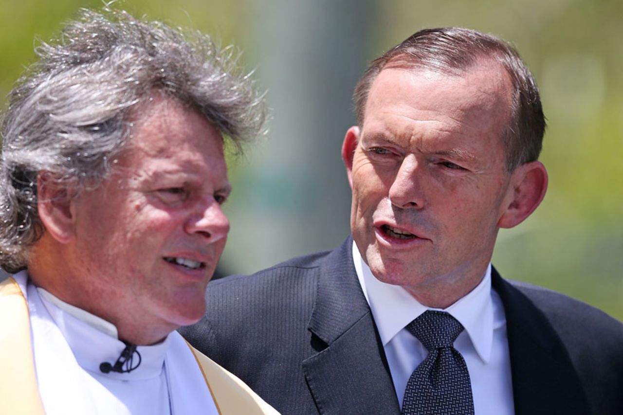 Australian prime minister Tony Abbott arrives for Phillip Hughes' funeral service, Macksville, December 3, 2014