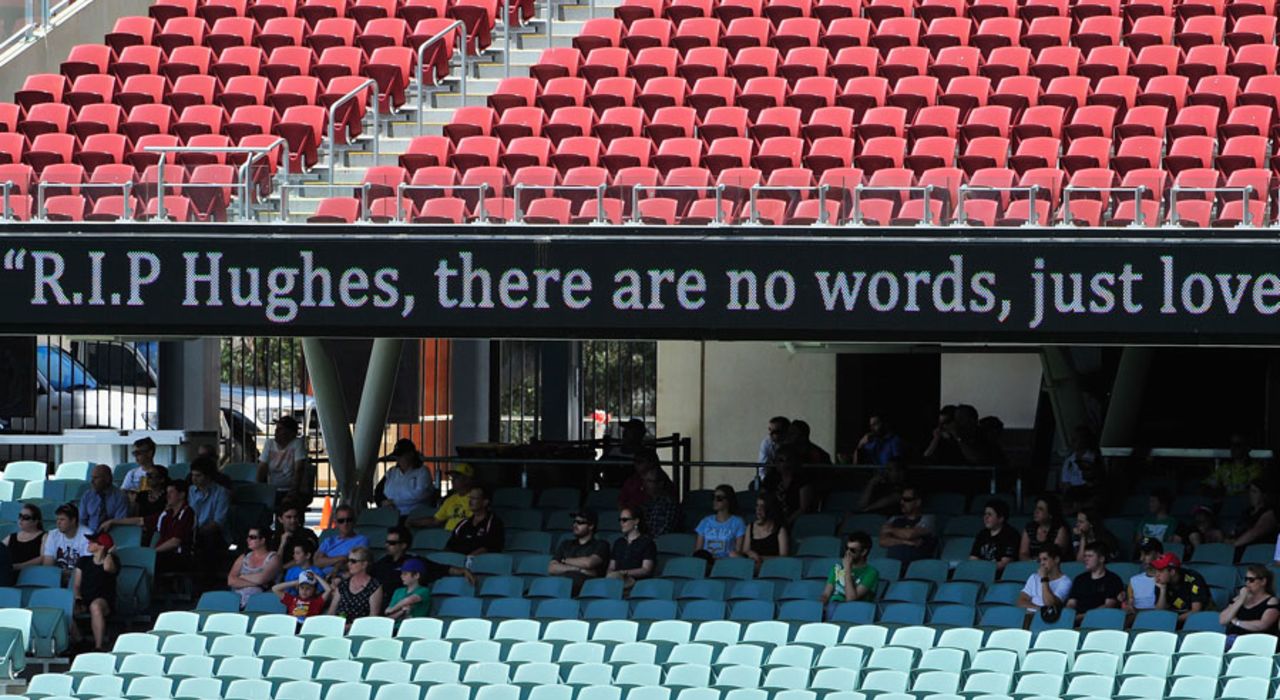 People start to gather at the Adelaide Oval to watch Phillip Hughes' funeral service in Macksville, Adelaide, December 3, 2014