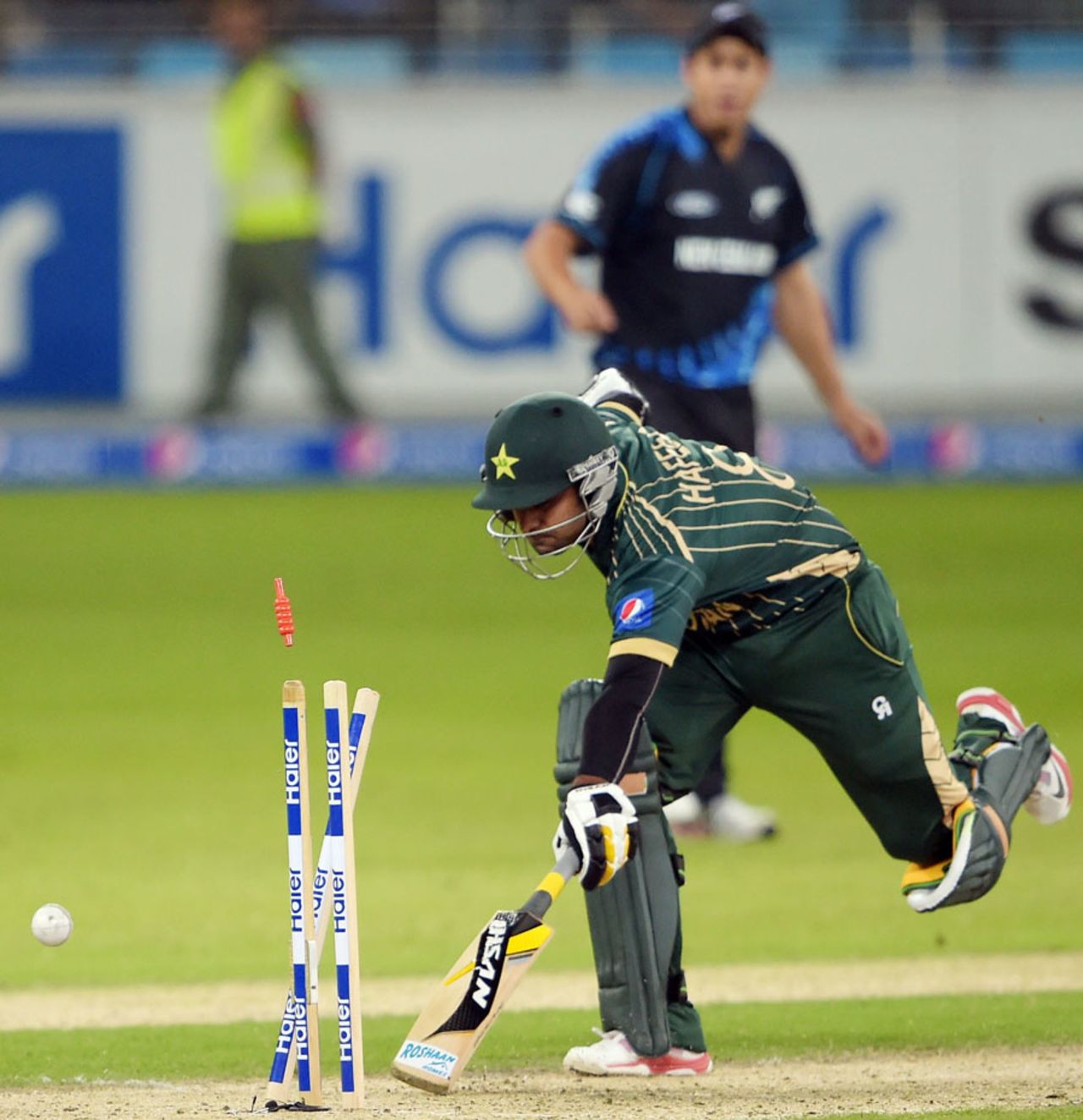 Mohammad Hafeez was run out for 2, Pakistan v New Zealand, 1st T20, Dubai, December 4, 2014