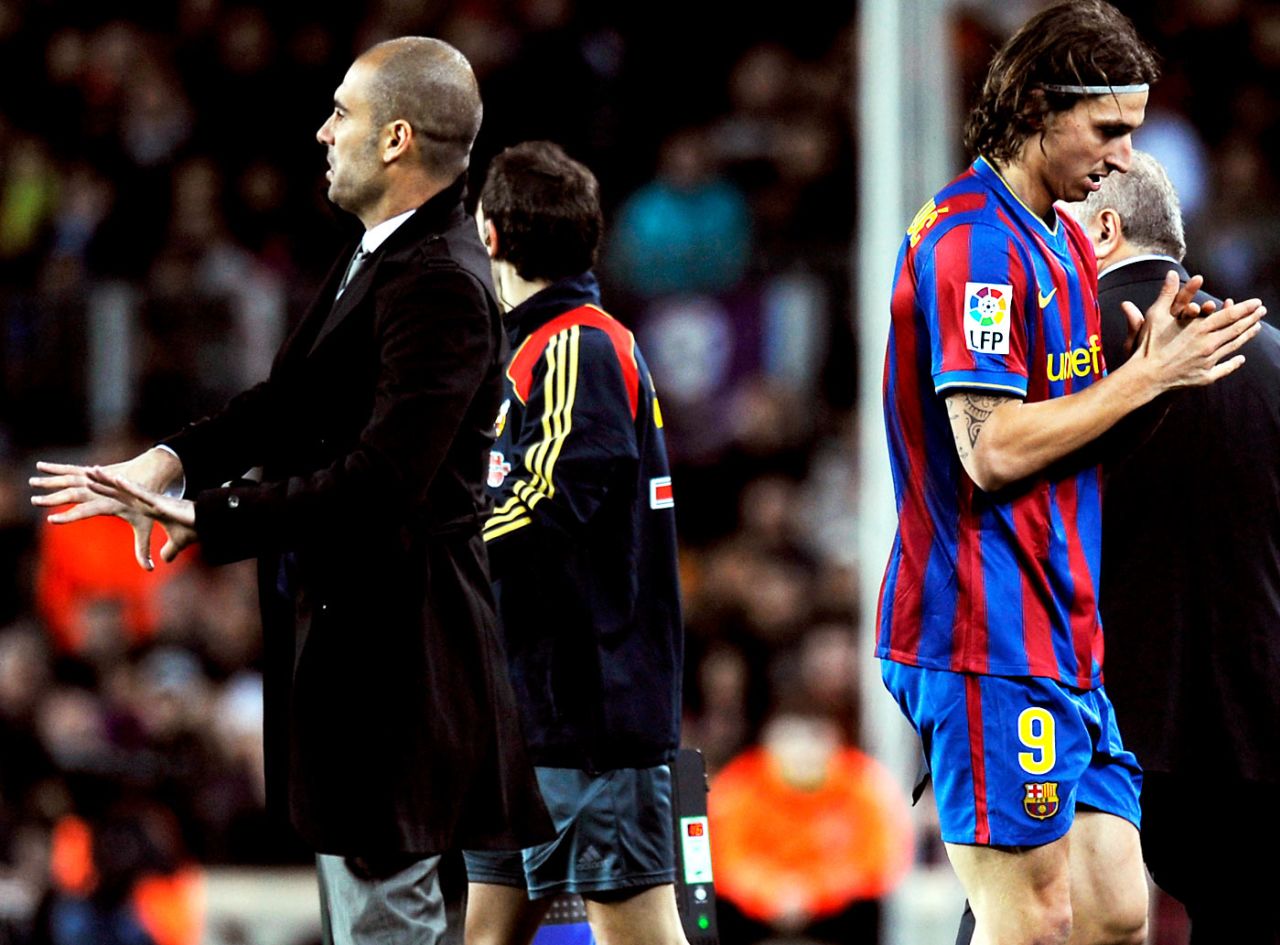 Zlatan Ibrahimovic walks off while manager Pep Guardiola watches the action, La Liga, Barcelona v Getafe, Camp Nou, Barcelona, February 6, 2010