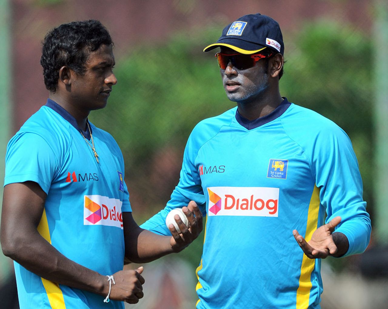 Ajantha Mendis chats with Angelo Mathews, Colombo, December 6, 2014