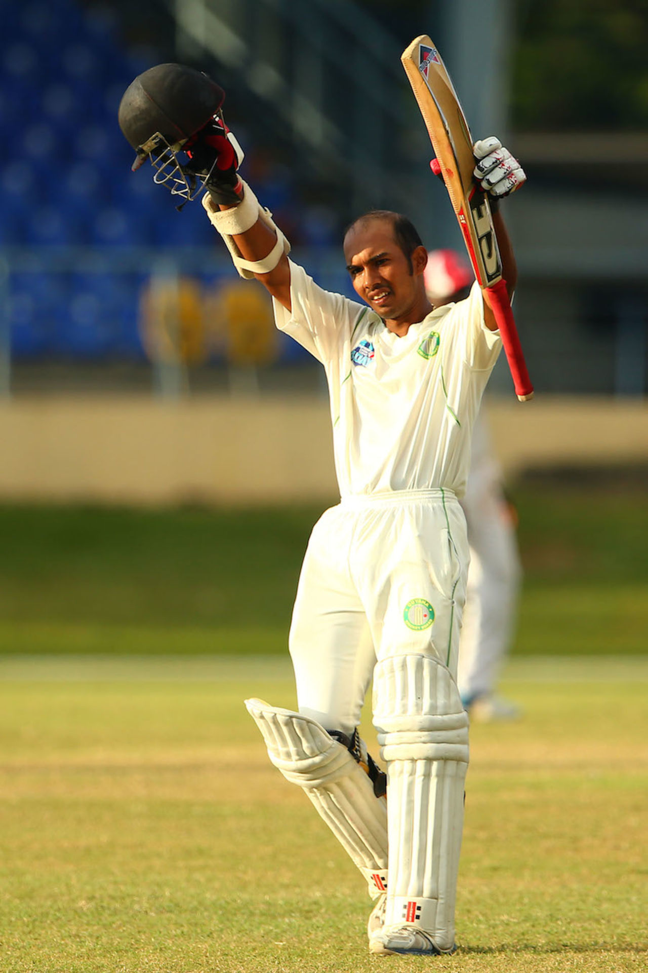Vishaul Singh celebrates his maiden first-class hundred, Trinidad & Tobago v Guyana, WI Professional League, 2nd day, Port of Spain, December 6, 2014