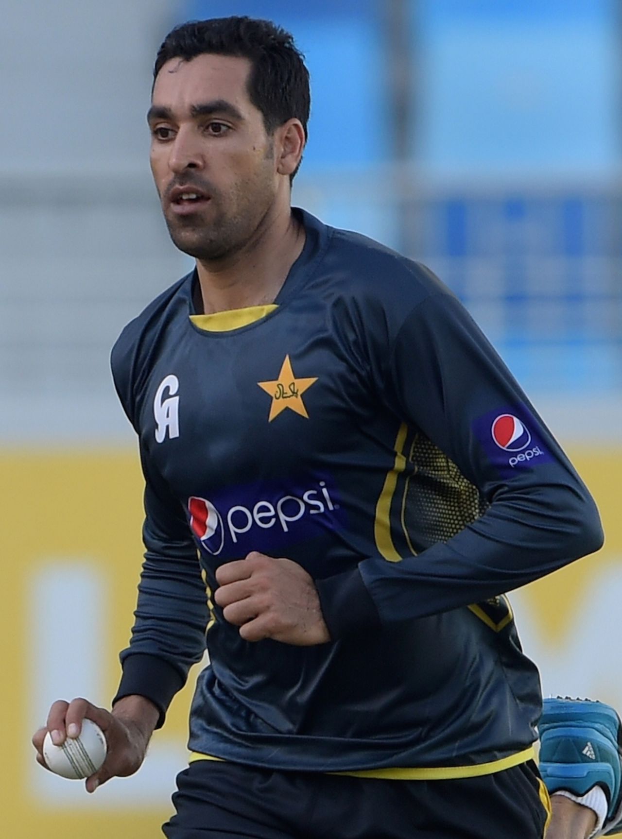 Umar Gul gets ready to bowl, Dubai, December 7, 2014