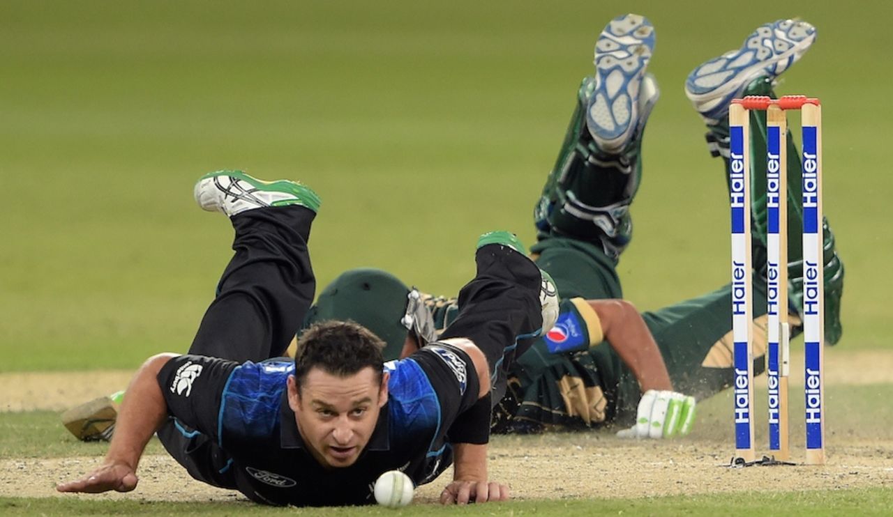 Nathan McCullum dives to stop the ball, Pakistan v New Zealand, 1st ODI, Dubai, December 8, 2014