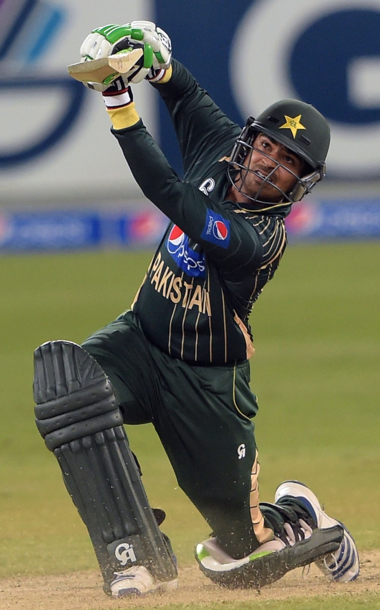 Haris Sohail goes down on a knee to drive, Pakistan v New Zealand, 1st ODI, Dubai, December 8, 2014