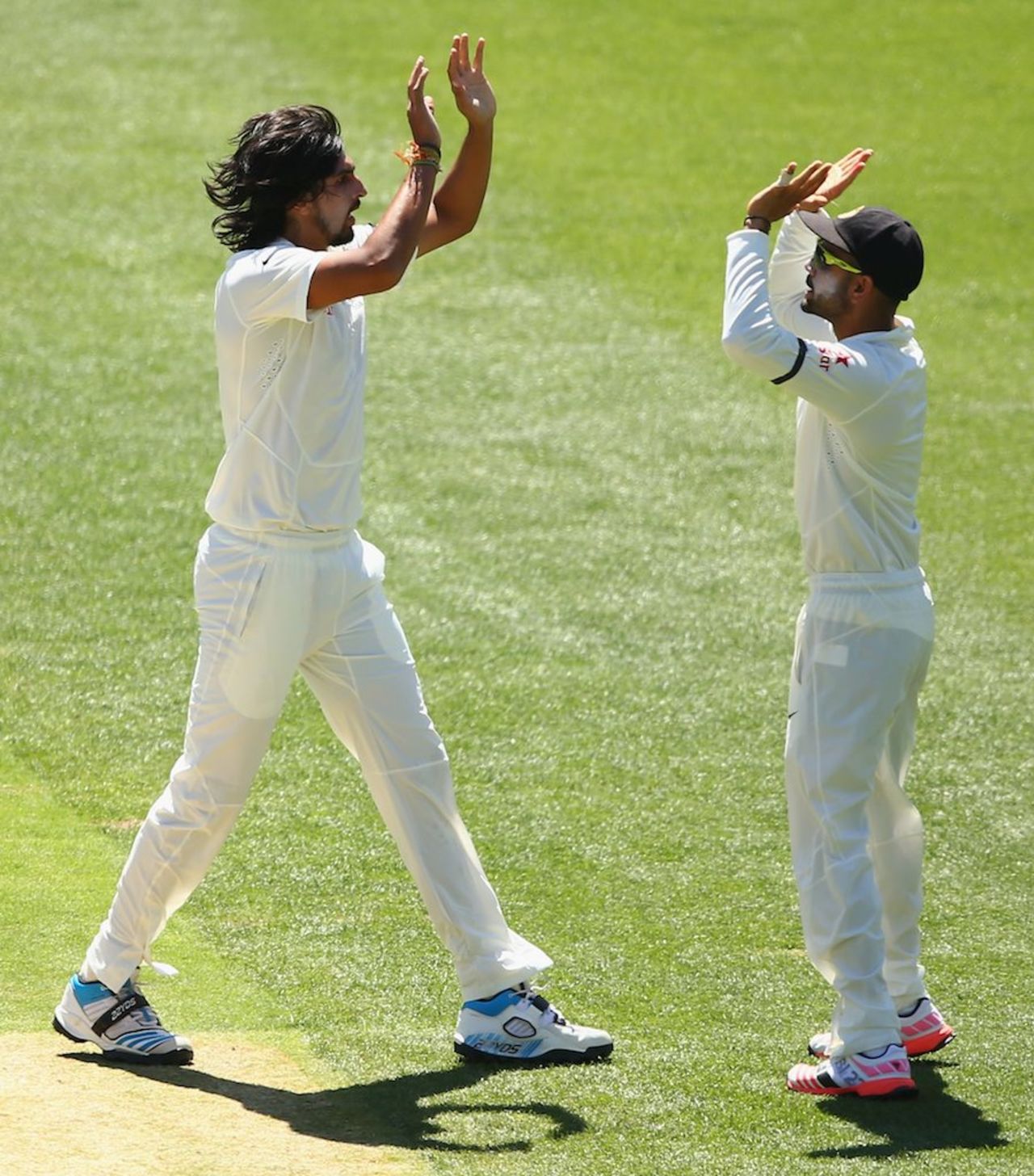 Ishant Sharma and Virat Kohli celebrate Chris Rogers' wicket, Australia v India, 1st Test, Adelaide, 1st day, December 9, 2014