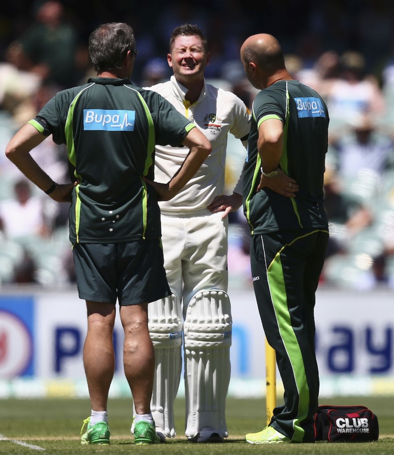 Michael Clarke grimaces in pain, Australia v India, 1st Test, Adelaide, 1st day, December 9, 2014