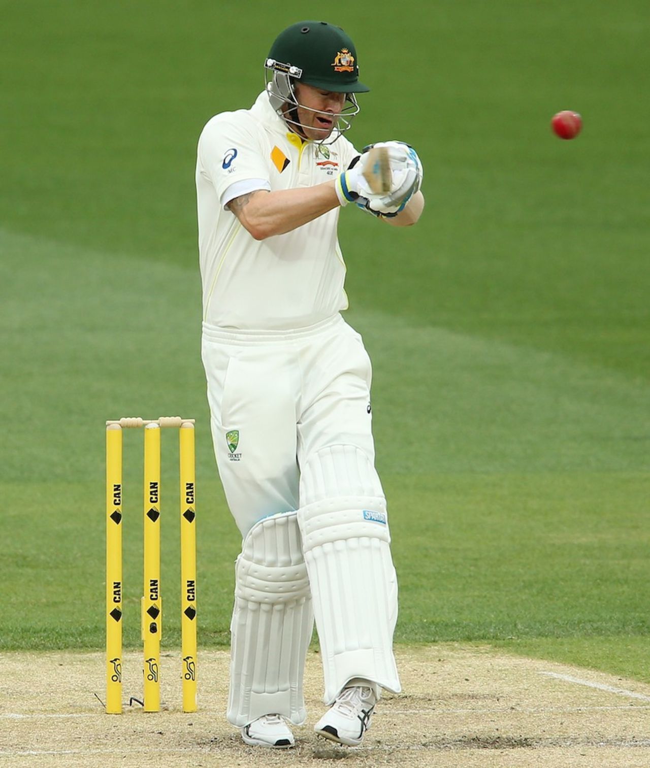 Michael Clarke winces as he pulls, Australia v India, 1st Test, Adelaide, 2nd day, December 10, 2014