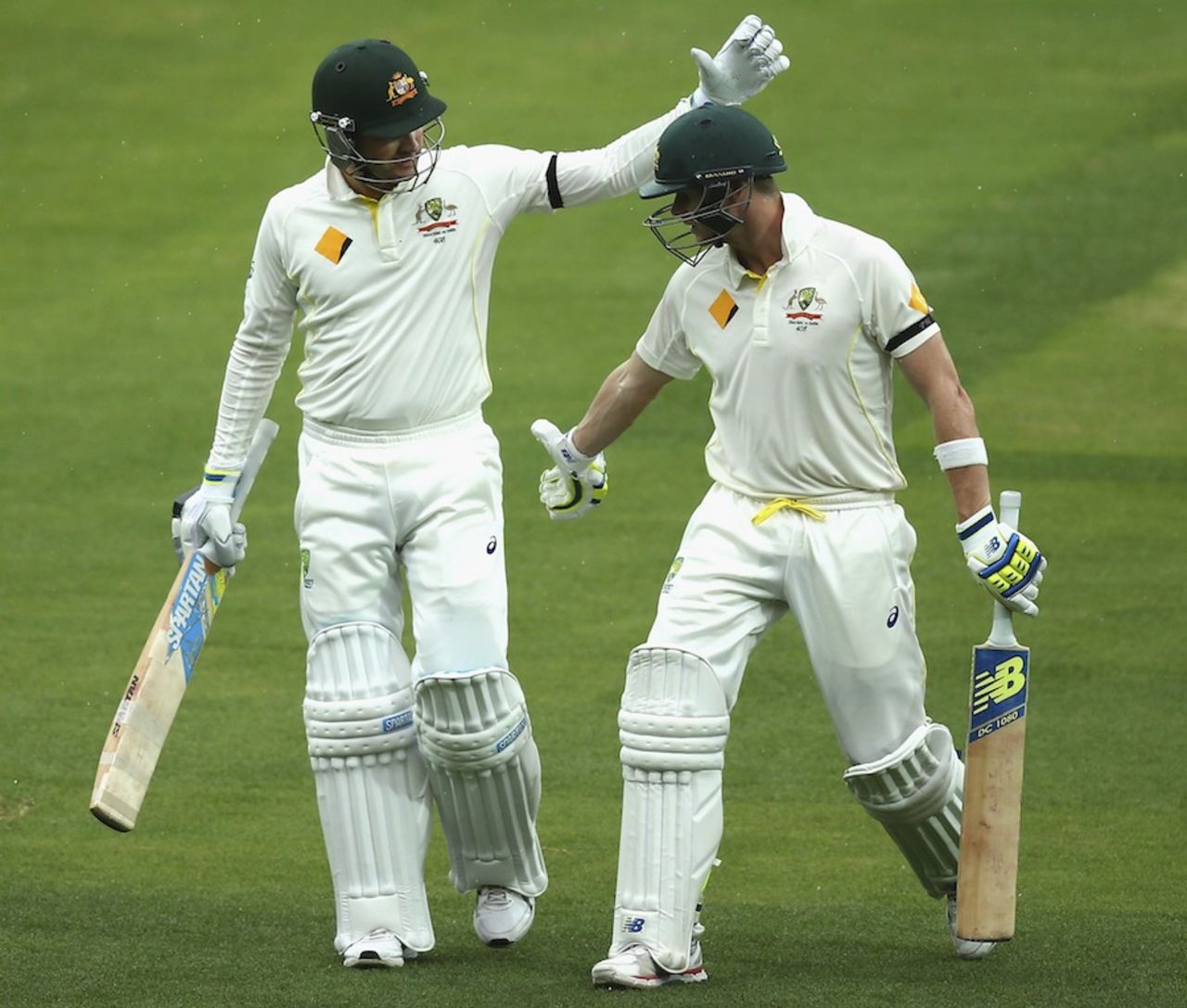 Michael Clarke and Steven Smith walk off because of rain, Australia v India, 1st Test, Adelaide, 2nd day, December 10, 2014