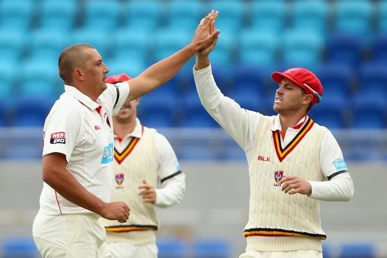 Trent Lawford celebrates a wicket, Tasmania v South Australia, Sheffield Shield, Hobart, 1st day, December 9, 2014