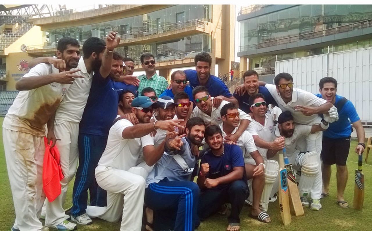 The Jammu & Kashmir team celebrate after their win over Mumbai, Mumbai v Jammu & Kashmir, Ranji Trophy 2014-15, Group A, Mumbai, 4th day, December 10, 2014