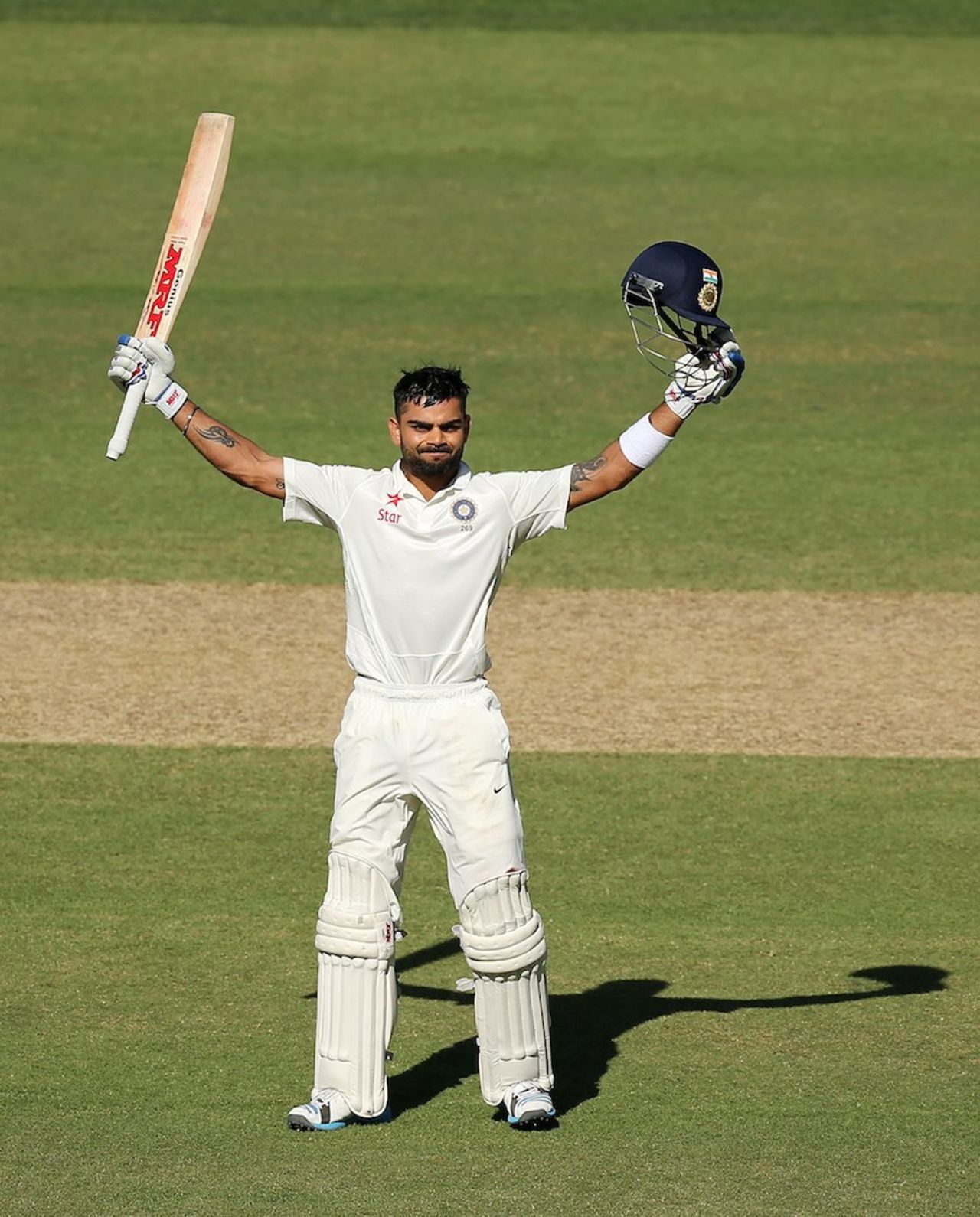 Virat Kohli celebrates a hundred in his first Test as captain, Australia v India, 1st Test, Adelaide, 3rd day, December 11, 2014