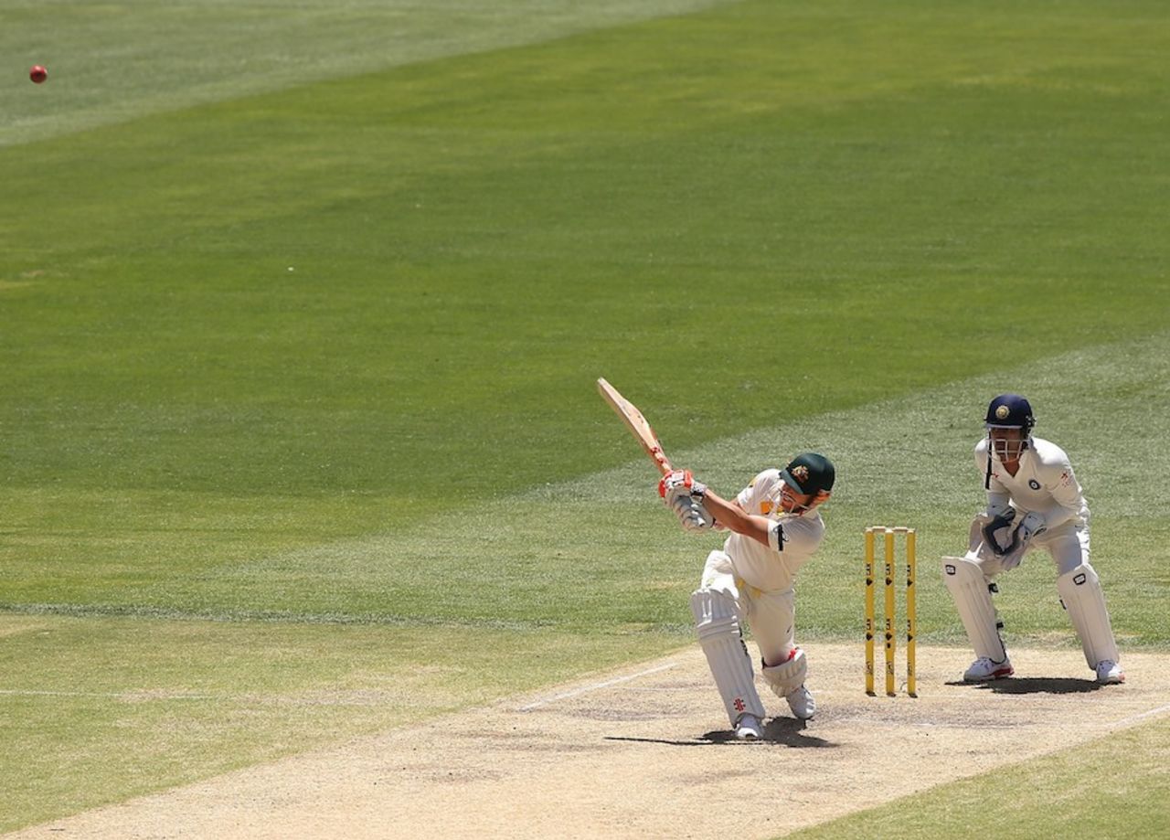 David Warner hits a six over midwicket, Australia v India, 1st Test, Adelaide, 4th day, December 12, 2014