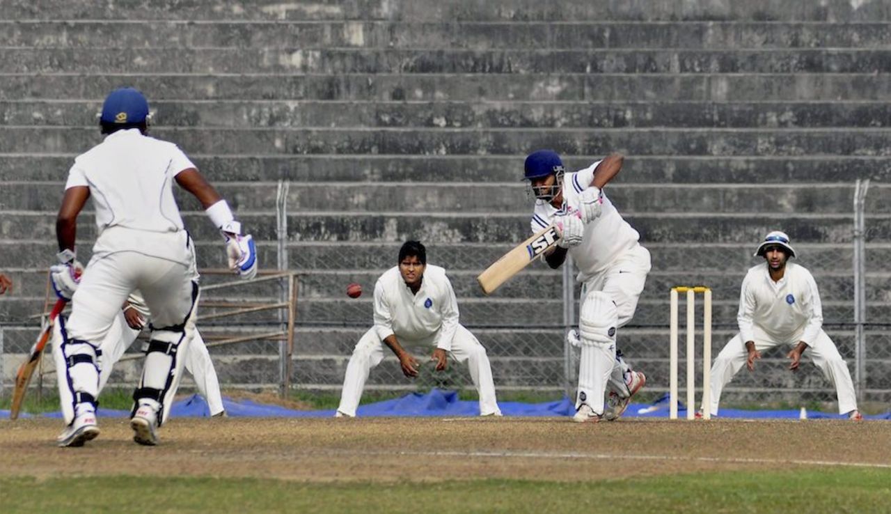 Arun Karthik pushes the ball down the ground, Assam v Jharkhand, Ranji Trophy, Group C, Guwahati, December 14, 2014