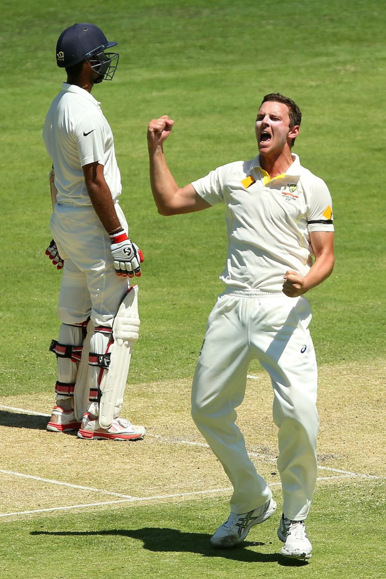 Josh Hazlewood celebrates Cheteshwar Pujara's wicket, Australia v India, 2nd Test, Brisbane, 1st day, December 17, 2014
