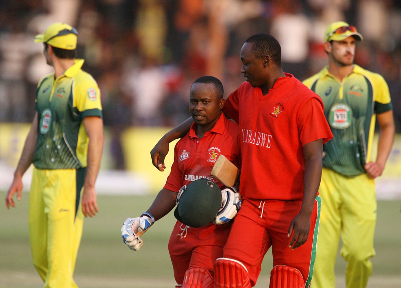 Prosper Utseya and Tendai Chatara celebrate the win, Zimbabwe v Australia, tri-series, Harare, August 31, 2014