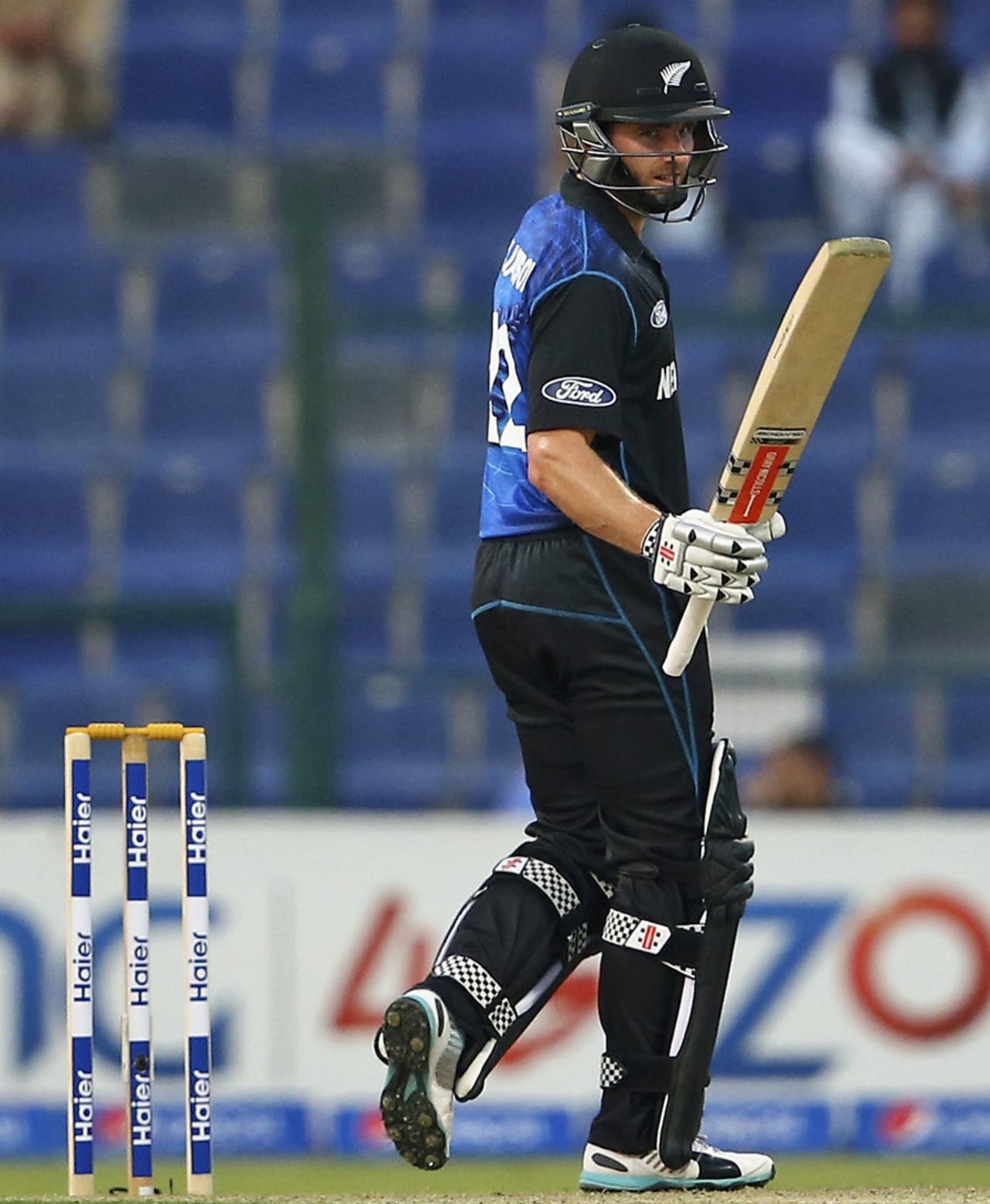 Kane Williamson raises his bat after reaching fifty, Pakistan v New Zealand, 4th ODI, Abu Dhabi, December 17, 2014, 