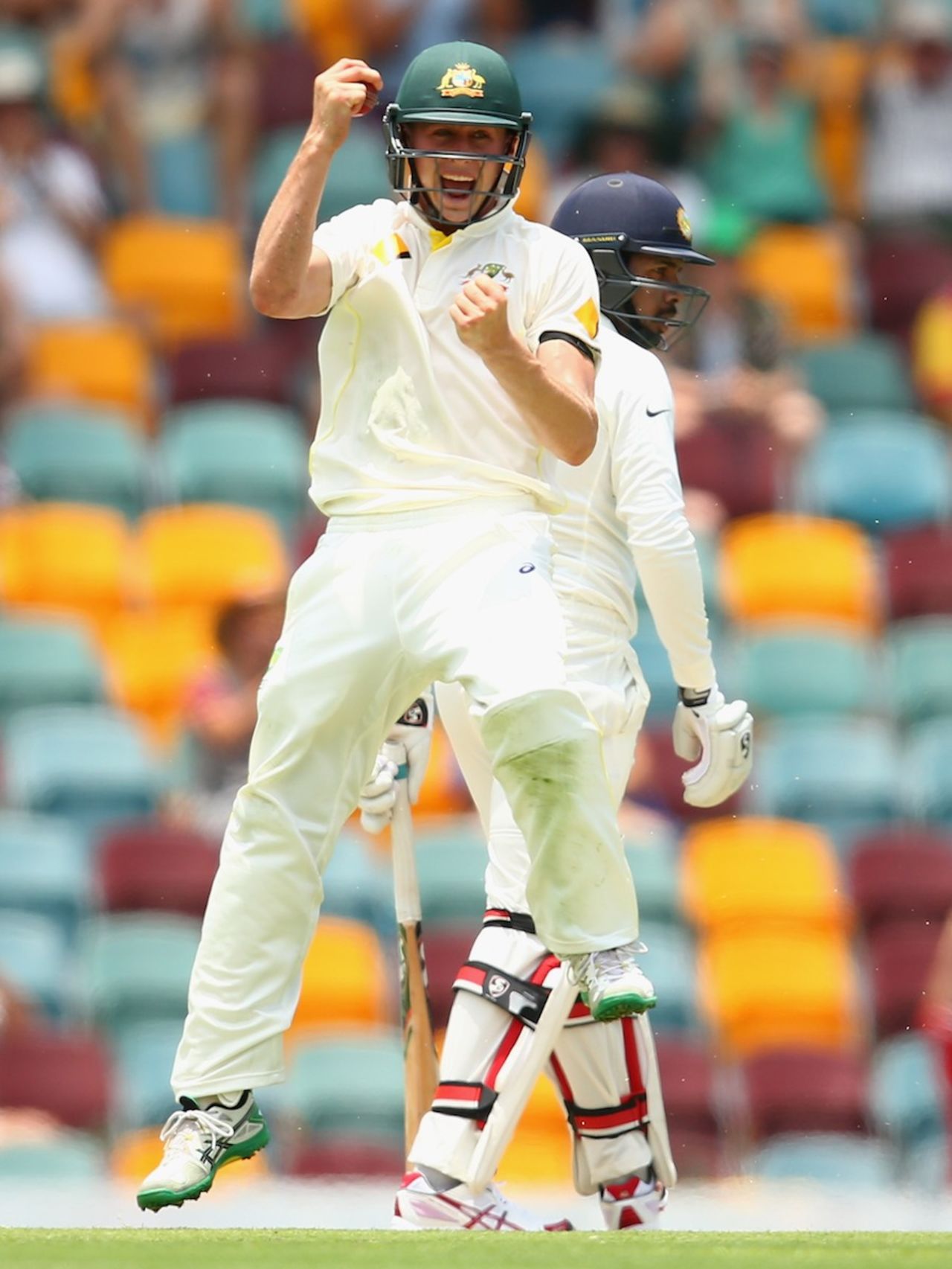 The substitute Marnus Labuschagne celebrates a stunning catch at short leg, Australia v India, 2nd Test, Brisbane, 2nd day, December 18, 2014