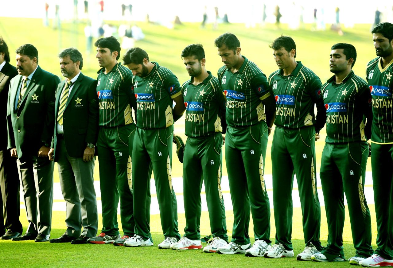 The Pakistan team observes two minutes of silence in memory of the victims of the Peshawar terror attack, Pakistan v New Zealand, 4th ODI, Abu Dhabi, December 17, 2014, 