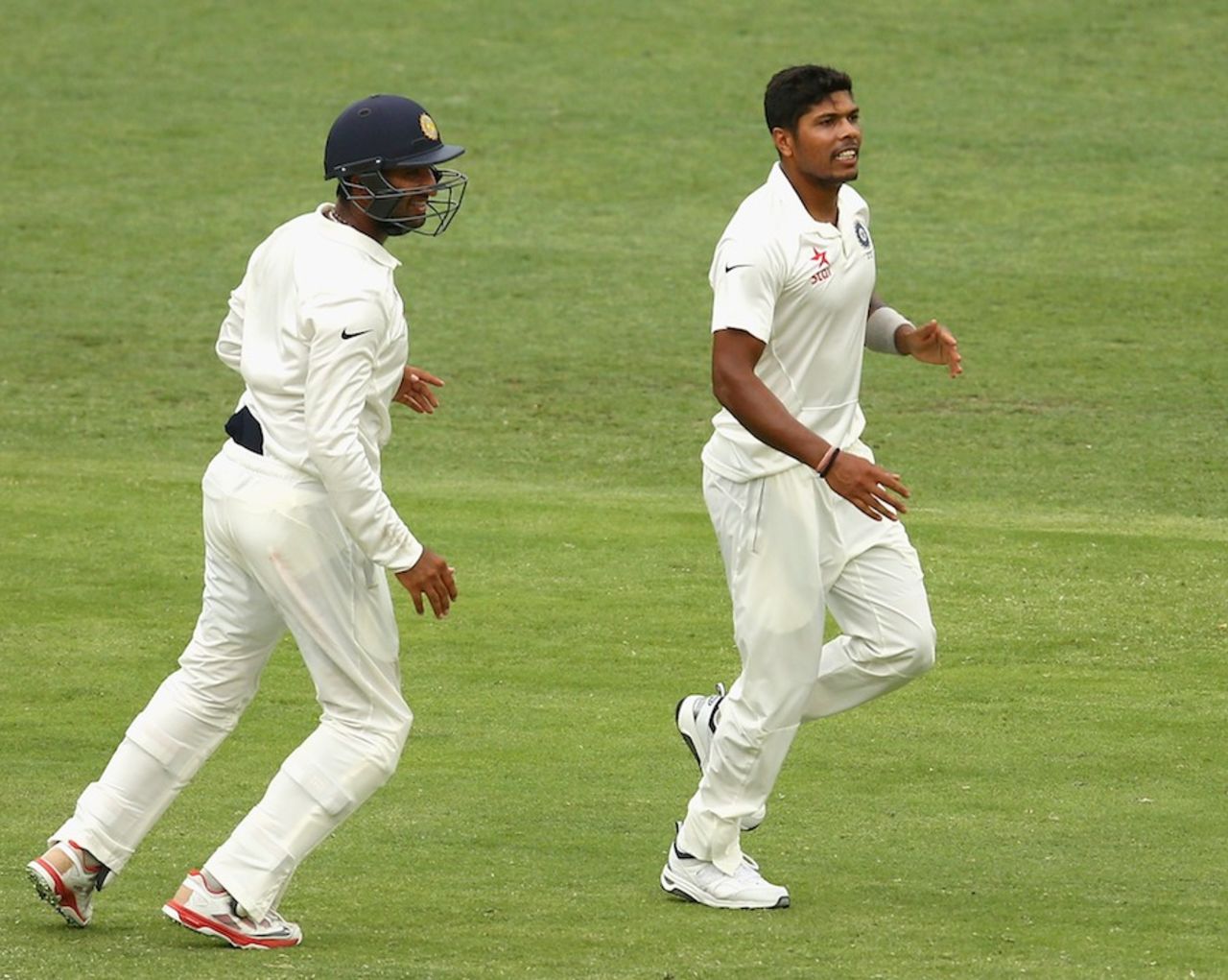 Umesh Yadav took three of the four Australian wickets to fall, Australia v India, 2nd Test, Brisbane, 2nd day, December 18, 2014