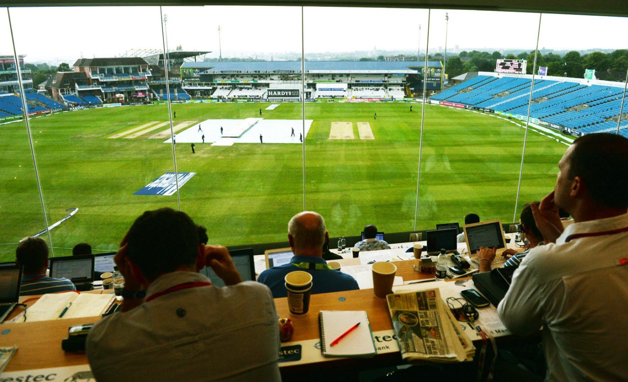 Journalists sit in the press box during a rain break England v Sri Lanka, 2nd Investec Test, Headingley, 5th day, June 24, 2014