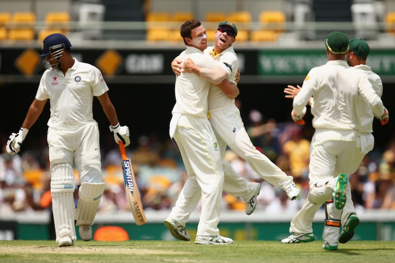 Josh Hazlewood is mobbed after dismissing MS Dhoni, Australia v India, 2nd Test, Brisbane, 4th day, December 20, 2014