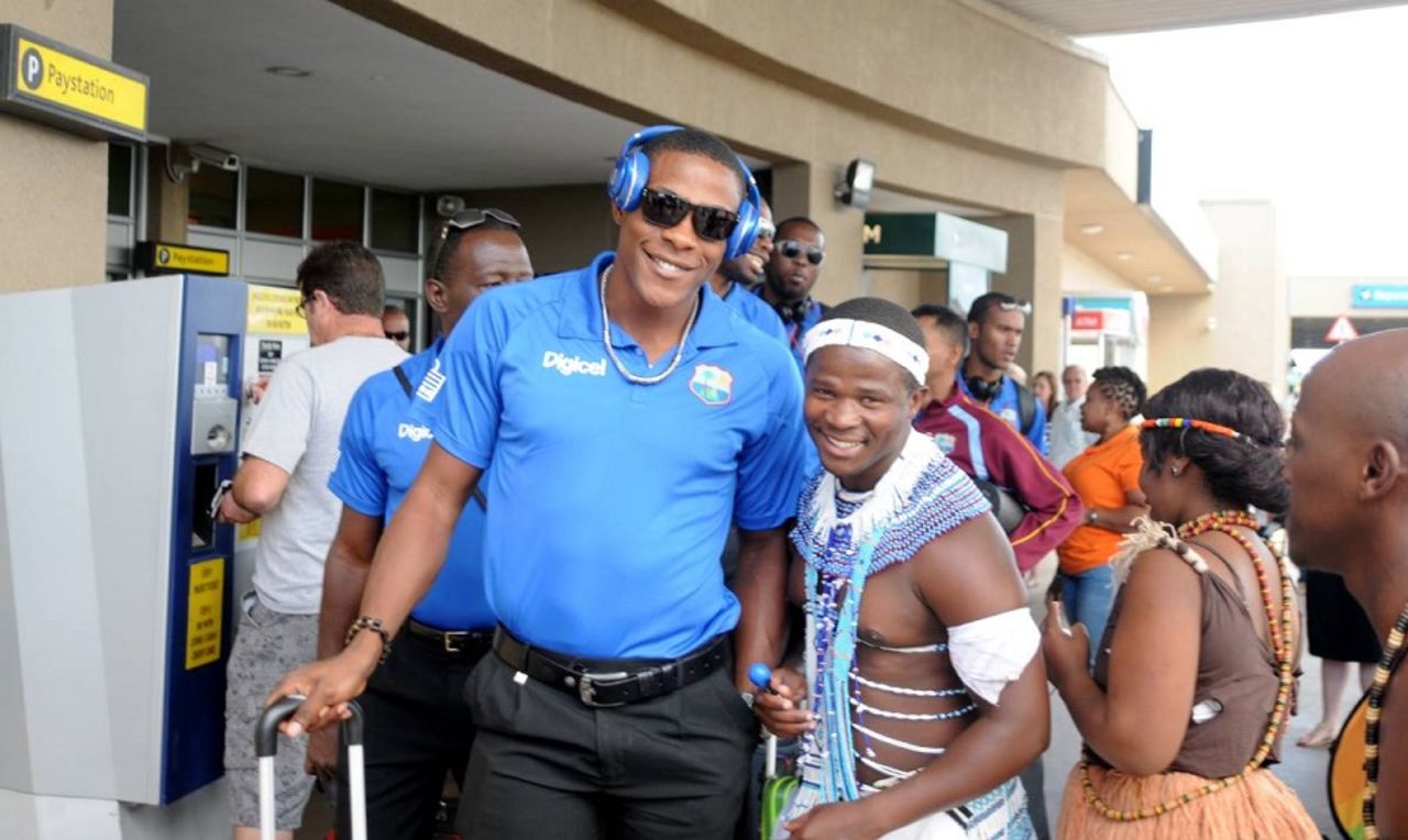 Sheldon Cottrell and the West Indies team get a warm welcome at Port Elizabeth airport, Port Elizabeth, December 22, 2014