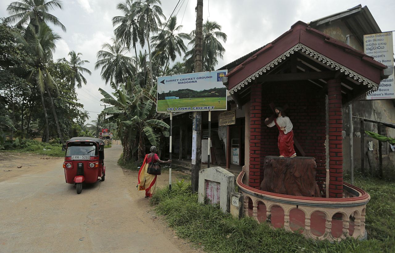 A signboard pointing to the Surrey Village Ground in Maggona, Sri Lanka, December 5, 2014