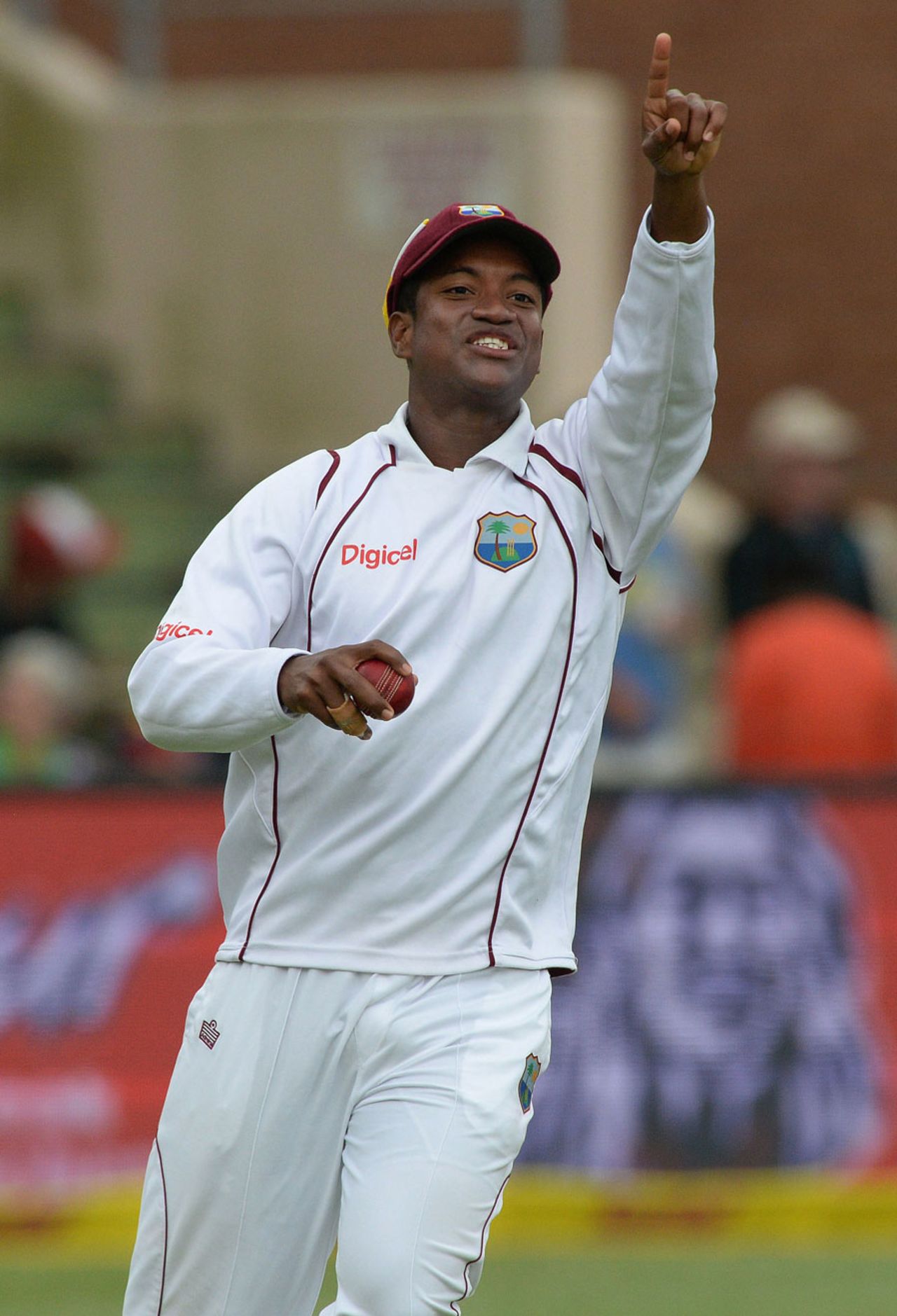 Leon Johnson celebrates taking the catch to dismiss Alviro Petersen, South Africa v West Indies, 2nd Test, Port Elizabeth, 1st day, December 26, 2014