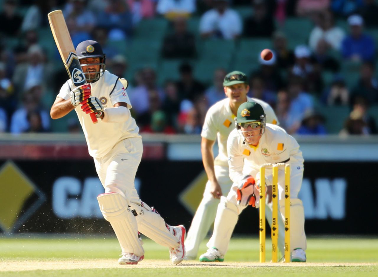 Cheteshwar Pujara taps one through the leg side, Australia v India, 3rd Test, Melbourne, 2nd day, December 27, 2014