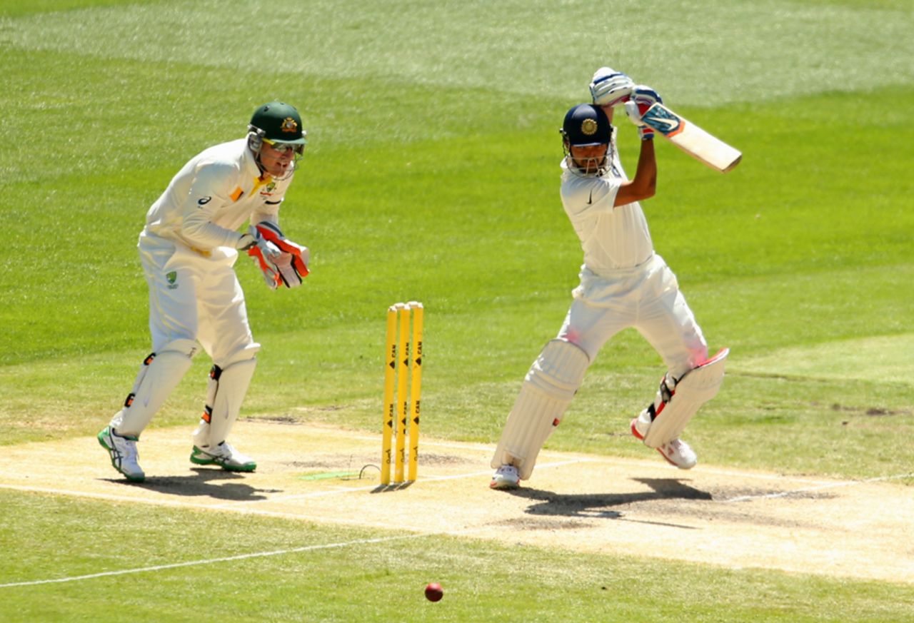 Ajinkya Rahane attempts to pierce the off side, Australia v India, 3rd Test, Melbourne, 3rd day, December 28, 2014