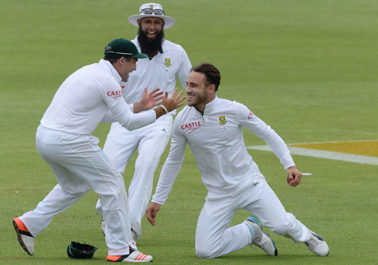 Faf du Plessis is congratulated after taking a catch, South Africa v West Indies, 2nd Test, Port Elizabeth, 3rd day, December 28, 2014