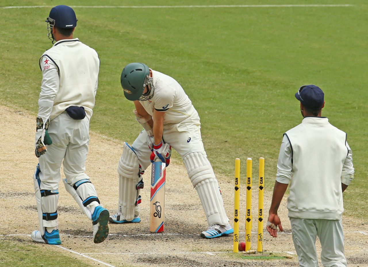 An R Ashwin delivery trickled onto Chris Rogers' stumps, Australia v India, 3rd Test, Melbourne, 4th day, December 29, 2014