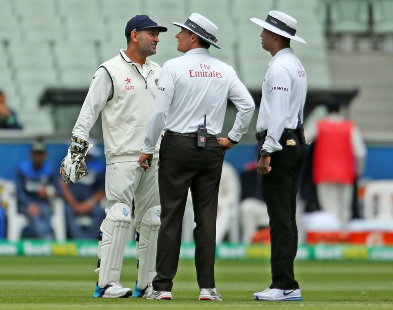 MS Dhoni has a chat with the umpires as a drizzle comes down, Australia v India, 3rd Test, Melbourne, 5th day, December 30, 2014