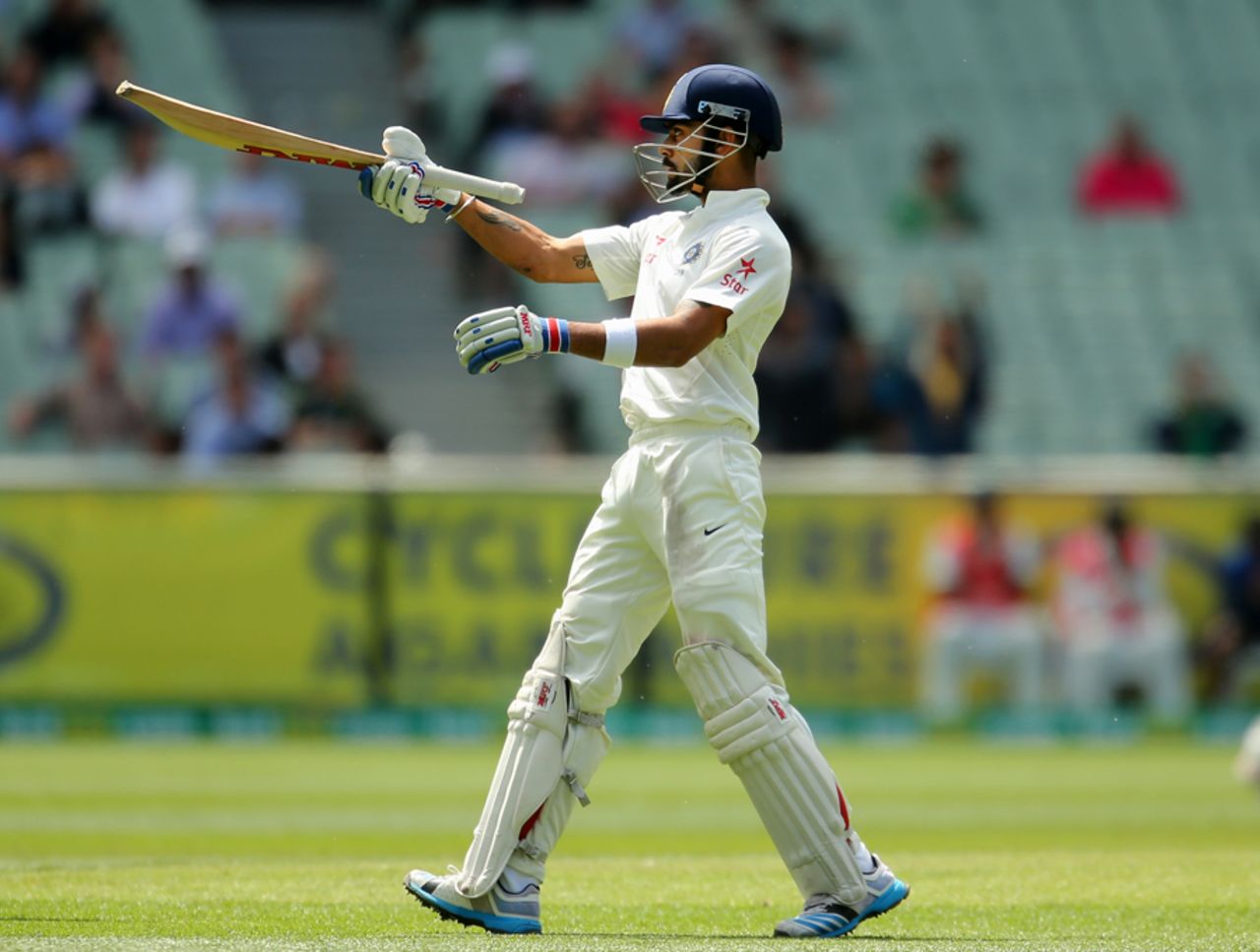 Virat Kohli celebrates his half-century, Australia v India, 3rd Test, Melbourne, 5th day, December 30, 2014