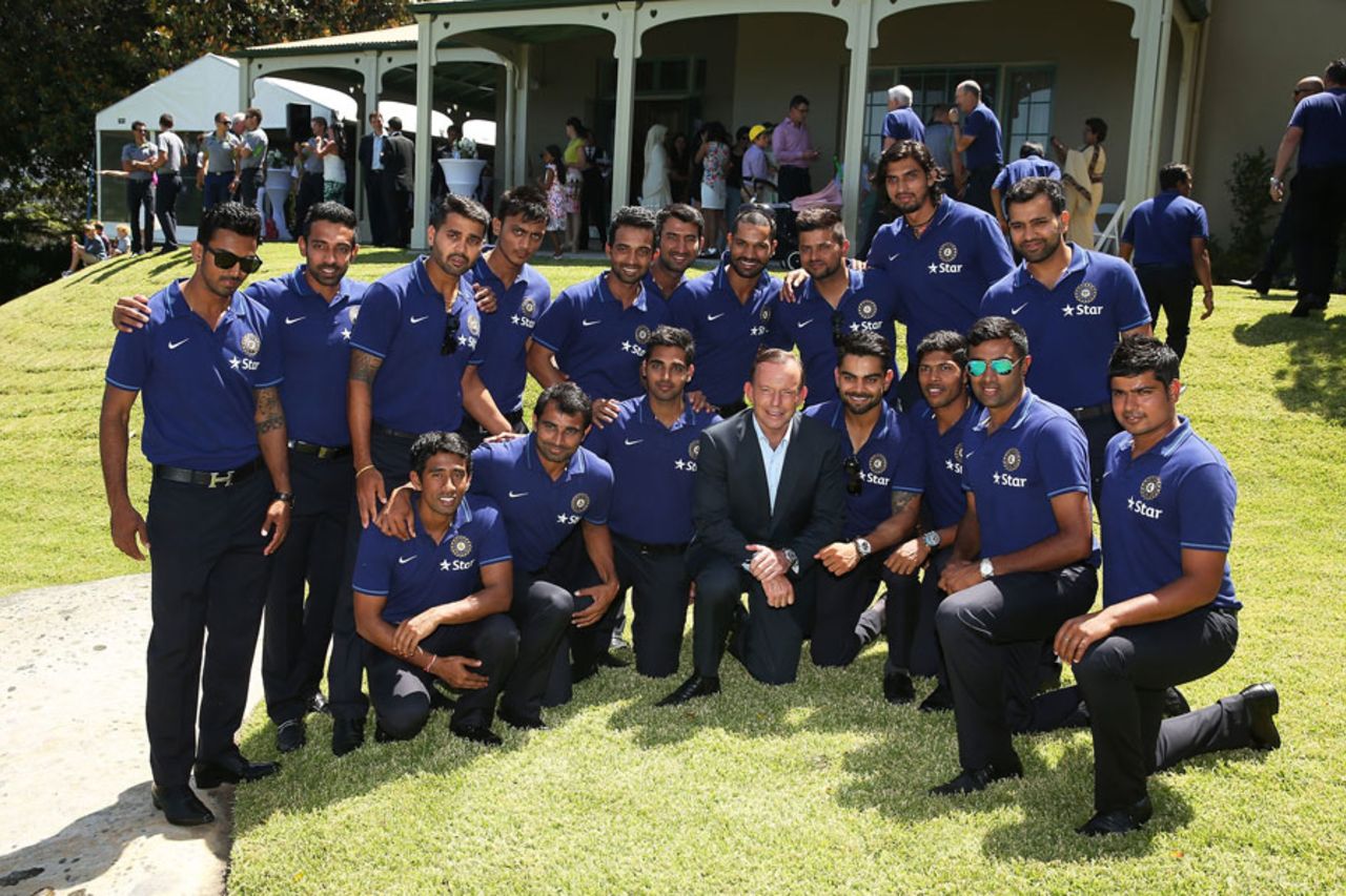 The India players pose for a photograph with Australian Prime Minister Tony Abbott, Sydney, January 1, 2015