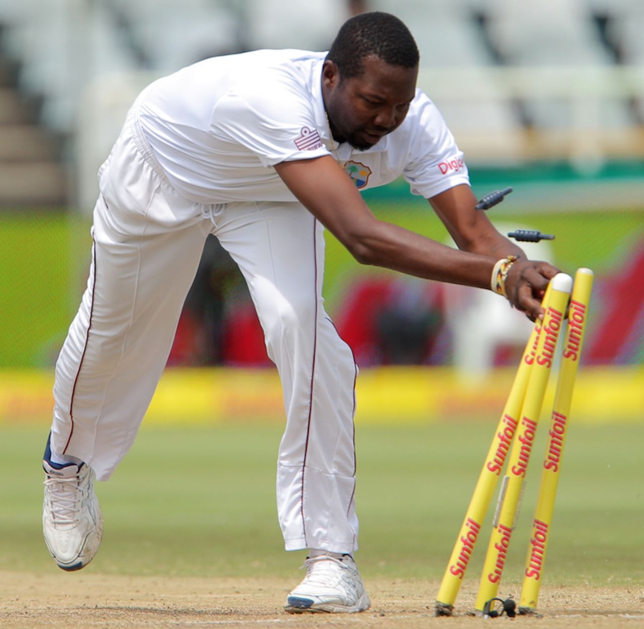 Sulieman Benn tries to run out Hashim Amla, South Africa v West Indies, 3rd Test, Cape Town, 3rd day, January 4, 2015