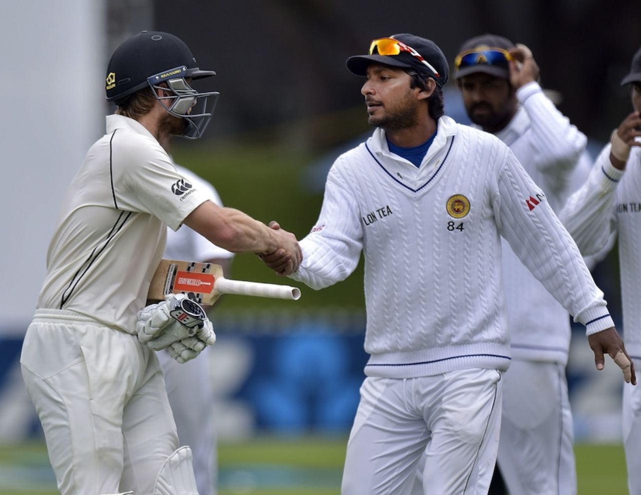 Kane Williamson and Kumar Sangakkara shake hands, New Zealand v Sri Lanka, 2nd Test, Wellington, 4th day, January 6, 2015